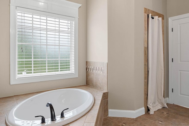 1011 Glessner Dr, Spring Hill, TN 37174 - bathroom featuring a garden tub and curtained shower