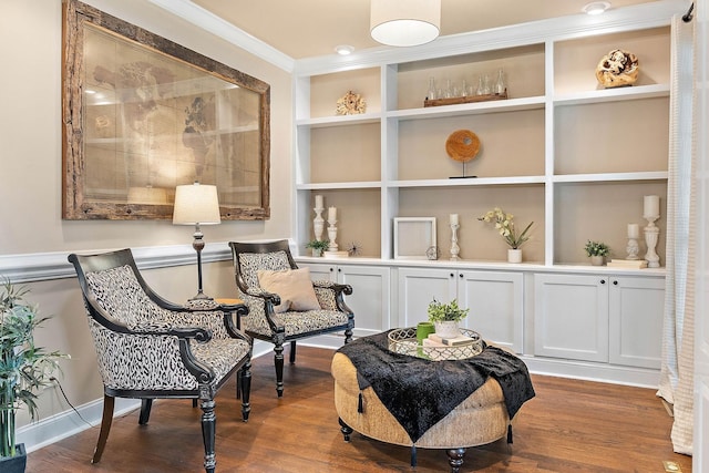 1011 Glessner Dr, Spring Hill, TN 37174 - sitting room featuring built in shelves, dark wood finished floors, and crown molding