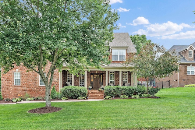 1011 Glessner Dr, Spring Hill, TN 37174 - view of front of home with a front lawn, brick siding, and roof with shingles