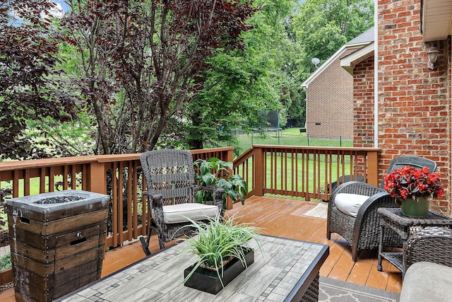 1011 Glessner Dr, Spring Hill, TN 37174 - deck featuring a yard and a trampoline