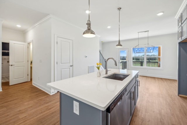 1894 Hamilton Chambers Rd, Lebanon, TN 37087 - kitchen with light wood finished floors, stainless steel dishwasher, light countertops, ornamental molding, and decorative light fixtures