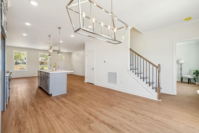 1894 Hamilton Chambers Rd, Lebanon, TN 37087 - kitchen with gray cabinetry, light wood-type flooring, recessed lighting, open floor plan, and an island with sink