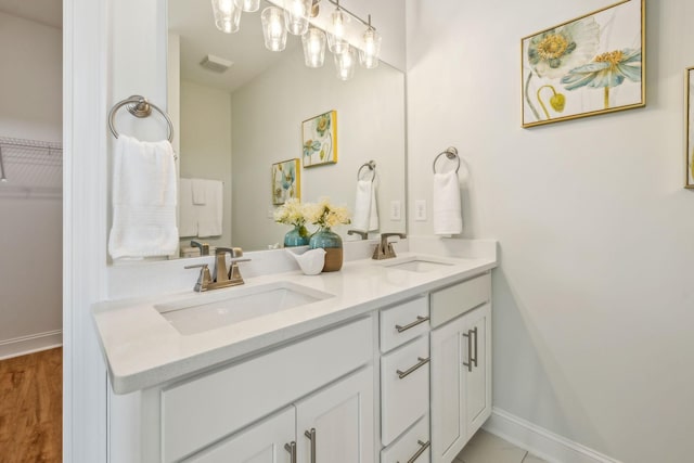 1894 Hamilton Chambers Rd, Lebanon, TN 37087 - full bath featuring double vanity, wood finished floors, and a walk in closet