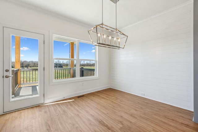 1894 Hamilton Chambers Rd, Lebanon, TN 37087 - spare room with a chandelier, light wood finished floors, and crown molding
