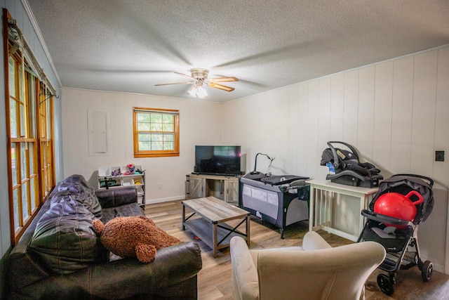 190 Blackwell Dr, Hohenwald, TN 38462 - living area with wood finished floors, ceiling fan, and a textured ceiling
