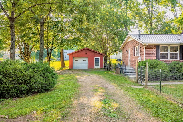 190 Blackwell Dr, Hohenwald, TN 38462 - detached garage featuring dirt driveway