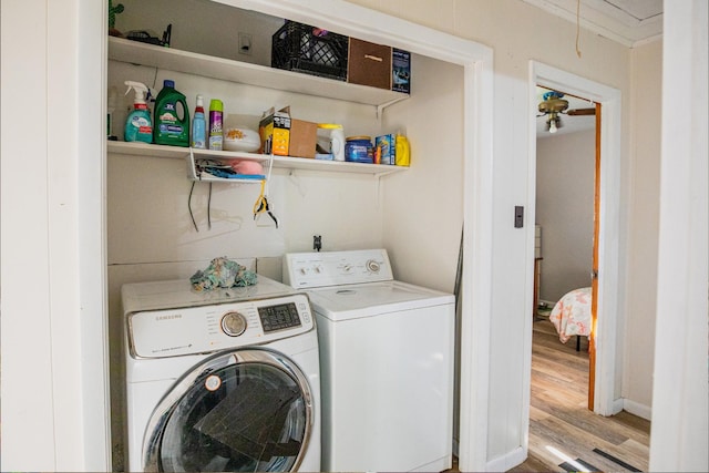 190 Blackwell Dr, Hohenwald, TN 38462 - laundry room featuring washing machine and dryer and wood finished floors