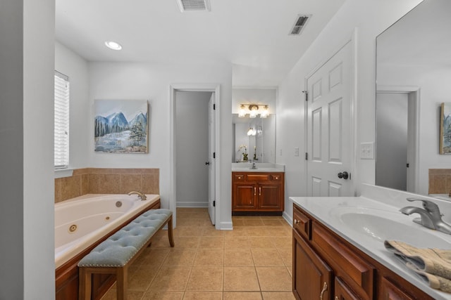 7767 Lynnle Way, Hixson, TN 37343 - full bath with two vanities, a jetted tub, and tile patterned floors