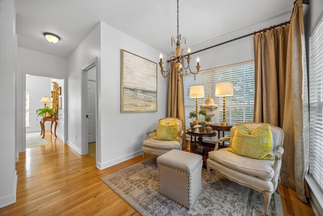 7767 Lynnle Way, Hixson, TN 37343 - living area featuring light wood-style floors and a chandelier