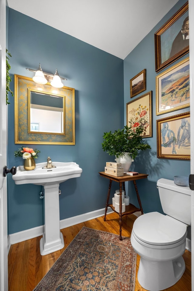 7767 Lynnle Way, Hixson, TN 37343 - half bathroom with baseboards and wood finished floors