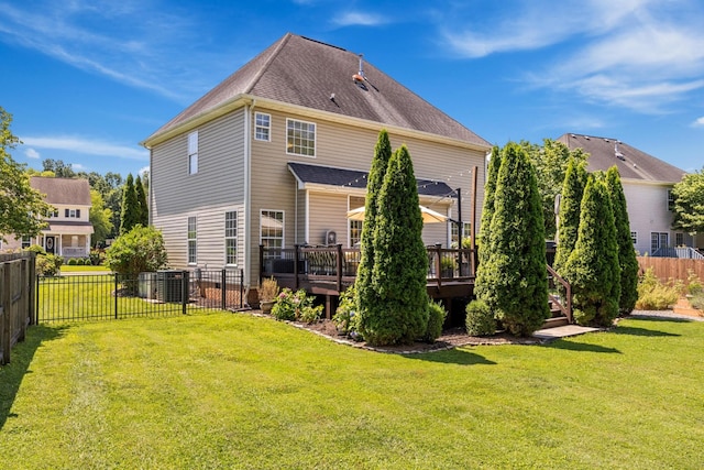 7767 Lynnle Way, Hixson, TN 37343 - back of house with a fenced backyard, a deck, and roof with shingles