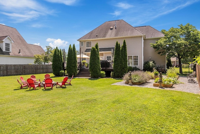 7767 Lynnle Way, Hixson, TN 37343 - back of property with a wooden deck and a fire pit