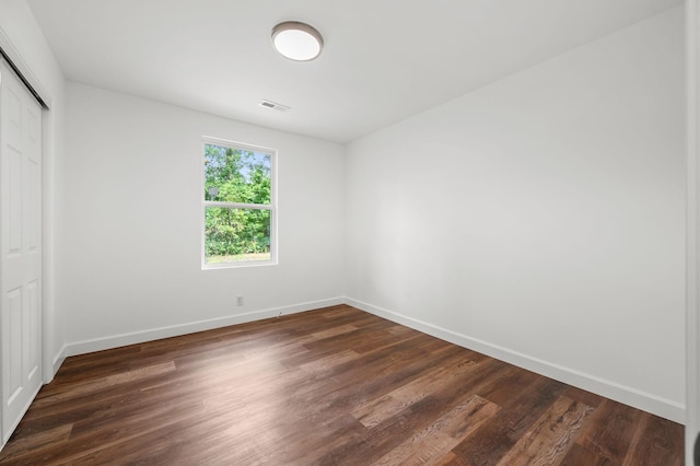 706 Mars St, Murfreesboro, TN 37130 - unfurnished bedroom with a closet and dark wood-style floors