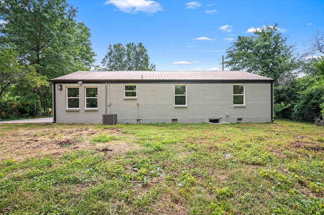 706 Mars St, Murfreesboro, TN 37130 - rear view of property featuring a metal roof, brick siding, crawl space, and a yard