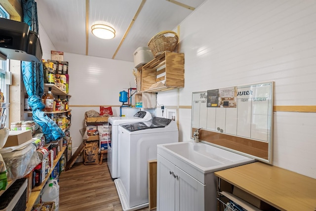 1786 Rocky Glade Rd, Eagleville, TN 37060 - laundry room with washing machine and dryer and wood finished floors