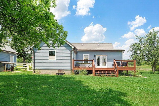 1786 Rocky Glade Rd, Eagleville, TN 37060 - rear view of property featuring a wooden deck, a metal roof, and french doors