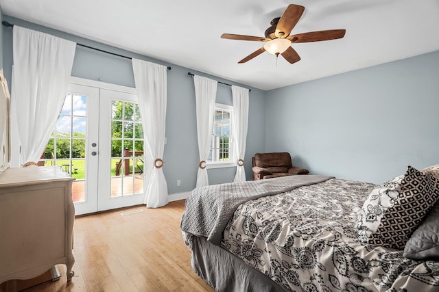 1786 Rocky Glade Rd, Eagleville, TN 37060 - bedroom with french doors, access to exterior, light wood-style flooring, and a ceiling fan