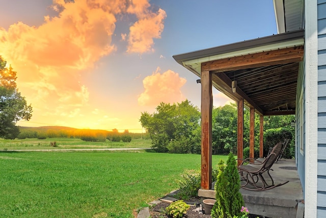 1786 Rocky Glade Rd, Eagleville, TN 37060 - yard at dusk featuring a lawn