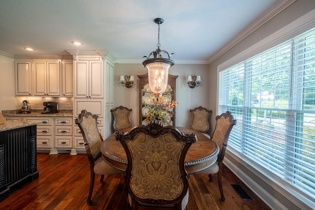 130 Fairway Cir, Loretto, TN 38469 - dining area featuring a chandelier, dark wood finished floors, crown molding, and recessed lighting