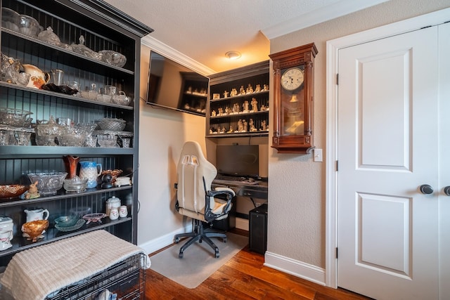 130 Fairway Cir, Loretto, TN 38469 - office featuring wood finished floors, ornamental molding, and built in desk