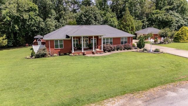 130 Fairway Cir, Loretto, TN 38469 - ranch-style house featuring a front yard, brick siding, and concrete driveway