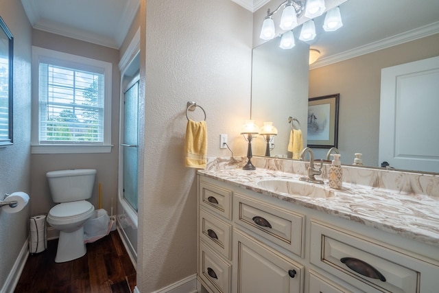 130 Fairway Cir, Loretto, TN 38469 - bathroom with wood finished floors, crown molding, vanity, bath / shower combo with glass door, and a textured wall
