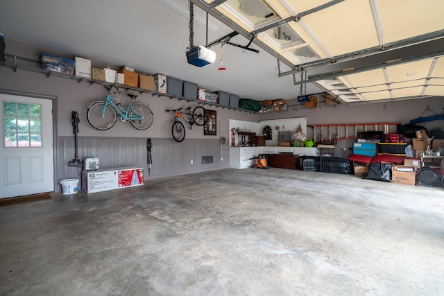 130 Fairway Cir, Loretto, TN 38469 - garage featuring a garage door opener