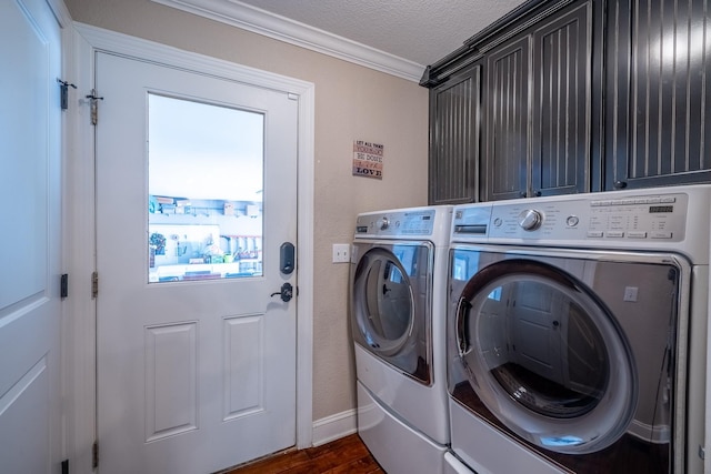 130 Fairway Cir, Loretto, TN 38469 - laundry area featuring washer and clothes dryer, crown molding, cabinet space, dark wood-style flooring, and a textured ceiling