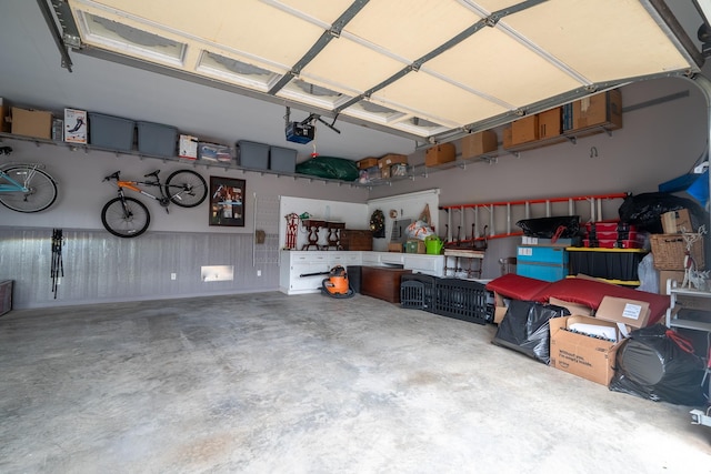 130 Fairway Cir, Loretto, TN 38469 - garage featuring a garage door opener