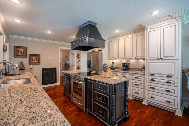 130 Fairway Cir, Loretto, TN 38469 - kitchen featuring stainless steel appliances, ventilation hood, light stone countertops, dark wood-style floors, and crown molding