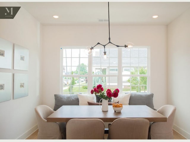 1572 Madison St, Chattanooga, TN 37408 - dining space with healthy amount of natural light and recessed lighting