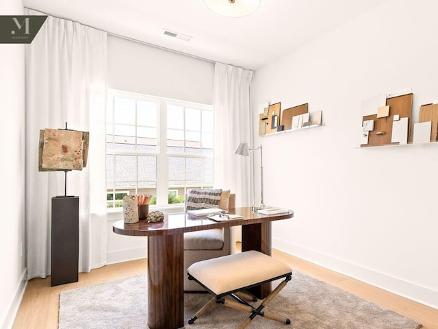 1572 Madison St, Chattanooga, TN 37408 - office area featuring baseboards and light wood-style flooring