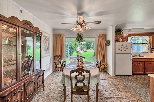 5007 Olivia Dr, Antioch, TN 37013 - carpeted dining area featuring ceiling fan and ornamental molding