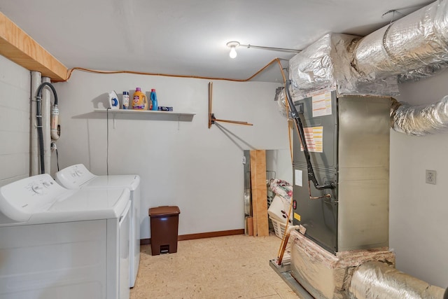 5007 Olivia Dr, Antioch, TN 37013 - laundry room with washing machine and dryer and heating unit
