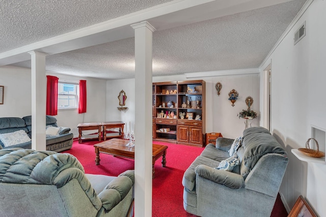 5007 Olivia Dr, Antioch, TN 37013 - carpeted living area with ornate columns and a textured ceiling