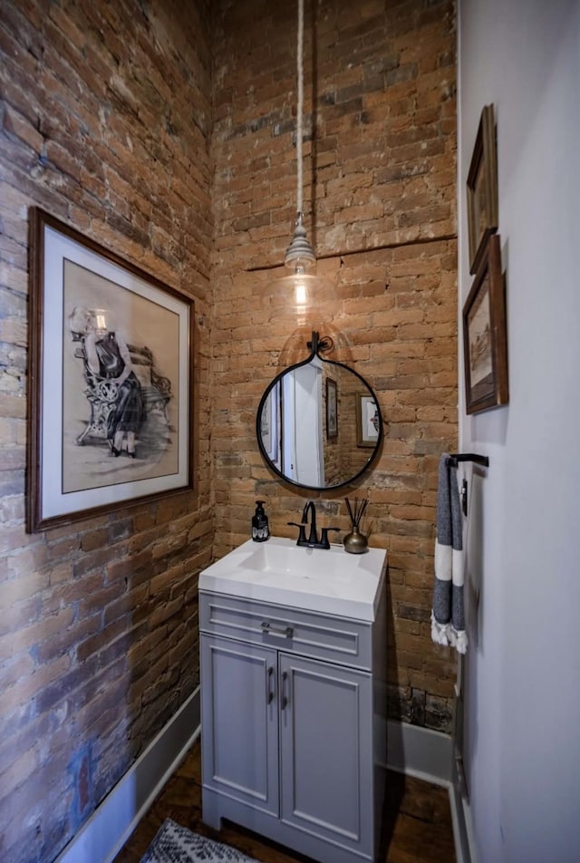 422 N Academy St, Murfreesboro, TN 37130 - bathroom with brick wall and vanity