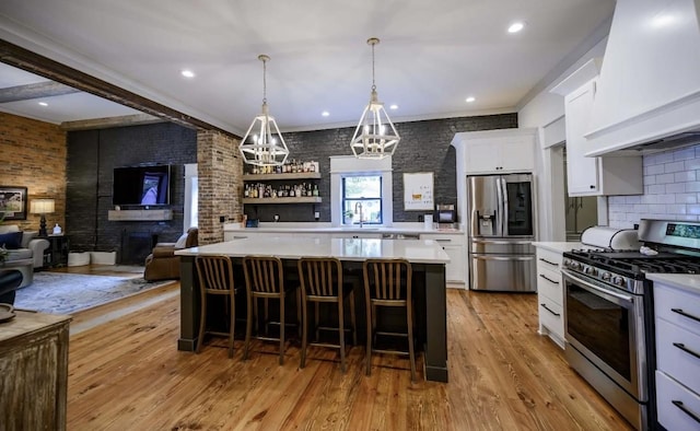 422 N Academy St, Murfreesboro, TN 37130 - kitchen featuring stainless steel appliances, custom exhaust hood, light countertops, a chandelier, and recessed lighting