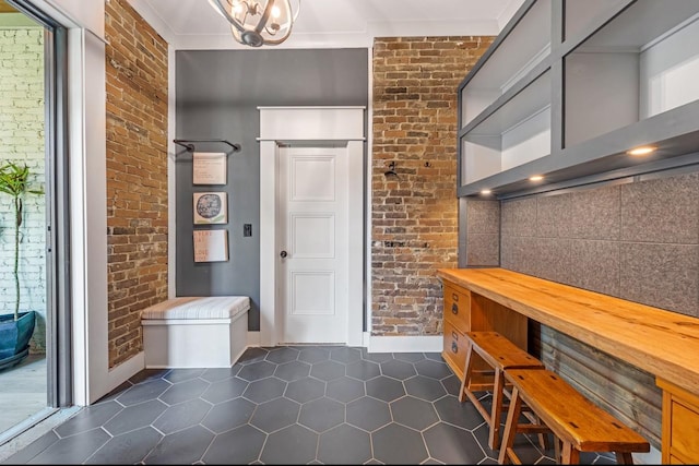 422 N Academy St, Murfreesboro, TN 37130 - foyer entrance with brick wall and dark tile patterned floors