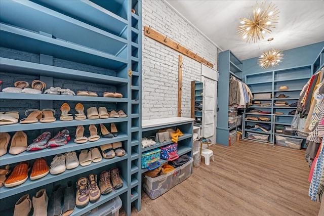 422 N Academy St, Murfreesboro, TN 37130 - walk in closet with a chandelier and wood finished floors