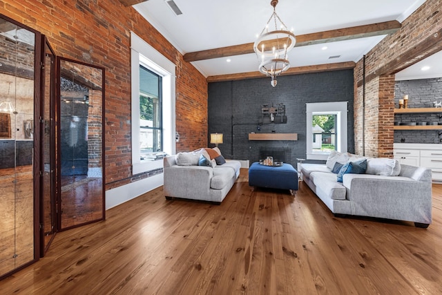 422 N Academy St, Murfreesboro, TN 37130 - living area with plenty of natural light, hardwood / wood-style flooring, beamed ceiling, a chandelier, and a large fireplace