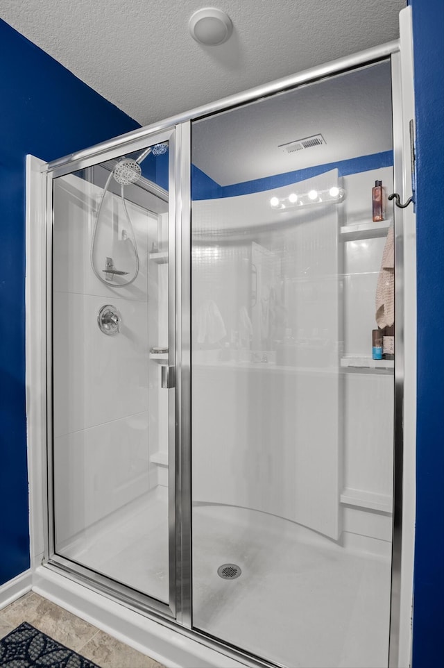 15252 Foamflower Ln, Sale Creek, TN 37373 - bathroom with a shower stall and tile patterned floors
