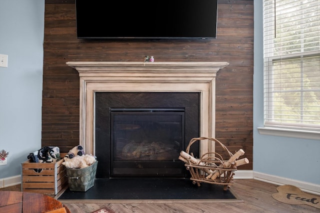 15252 Foamflower Ln, Sale Creek, TN 37373 - detailed view of a glass covered fireplace and wood finished floors