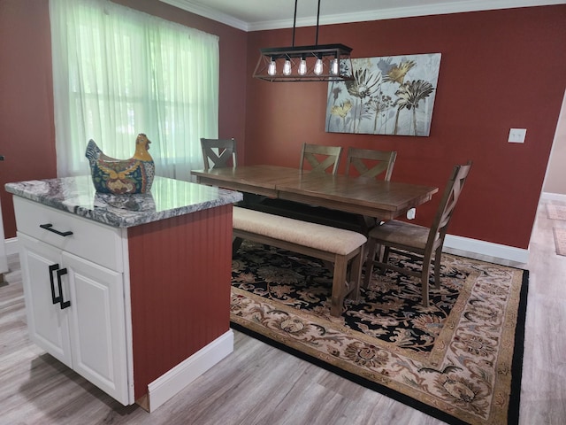 119 Horn Ave, Loretto, TN 38469 - dining area with light wood-type flooring and crown molding