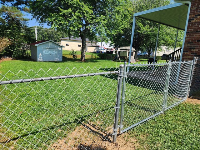 119 Horn Ave, Loretto, TN 38469 - view of yard featuring a storage shed and a gate