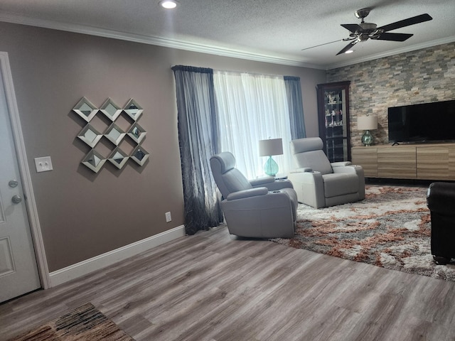 119 Horn Ave, Loretto, TN 38469 - living room featuring crown molding, a ceiling fan, wood finished floors, a textured ceiling, and recessed lighting