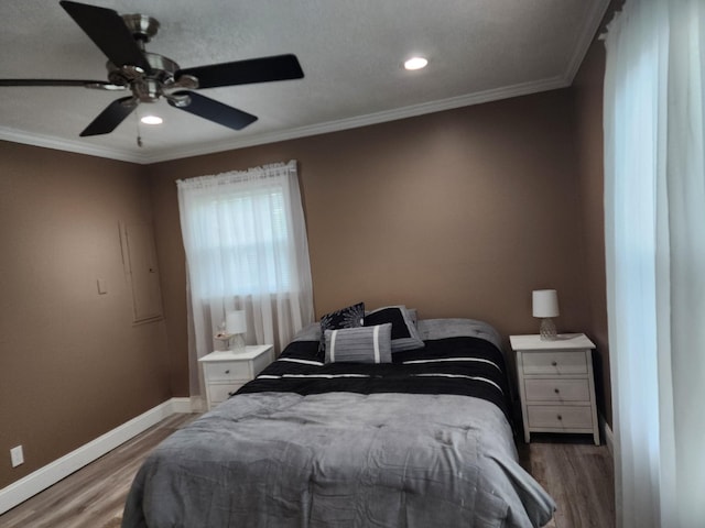 119 Horn Ave, Loretto, TN 38469 - bedroom with crown molding, light wood finished floors, recessed lighting, and ceiling fan