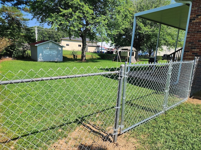 119 Horn Ave, Loretto, TN 38469 - view of yard with a storage unit and a gate