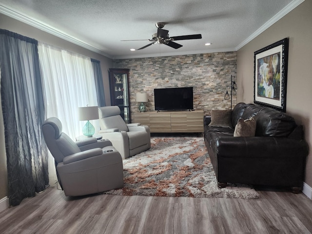 119 Horn Ave, Loretto, TN 38469 - living area with a textured ceiling, a ceiling fan, wood finished floors, ornamental molding, and recessed lighting