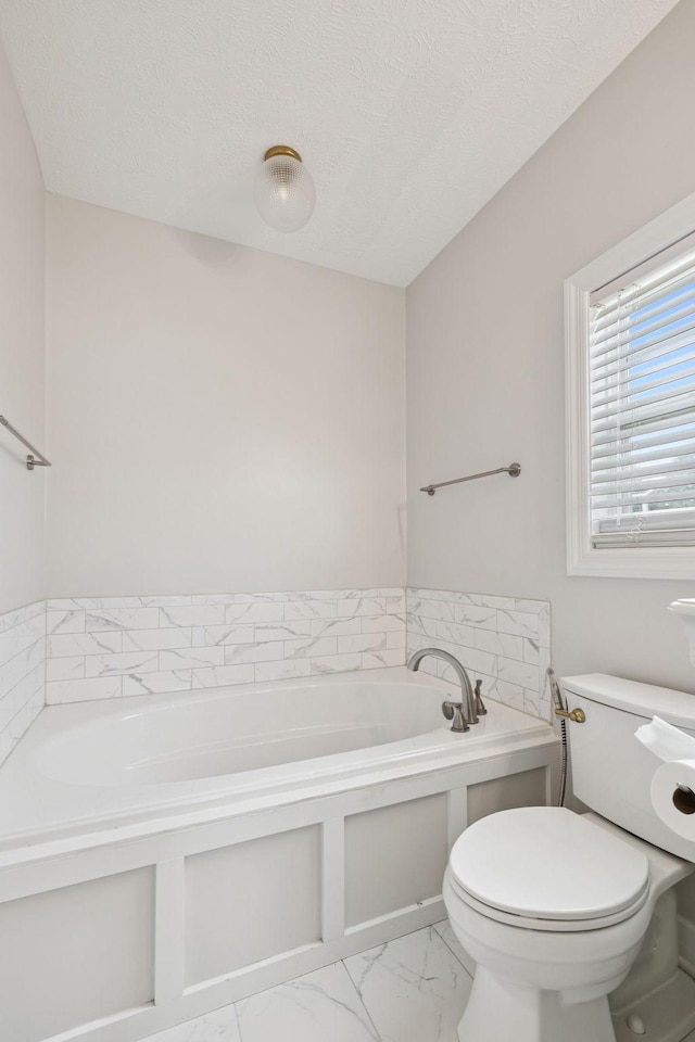 1704 Satterfield Ct, Murfreesboro, TN 37128 - bathroom featuring marble finish flooring, a garden tub, and a textured ceiling
