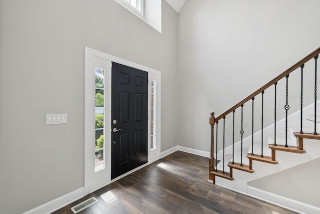1704 Satterfield Ct, Murfreesboro, TN 37128 - entryway featuring wood finished floors, a towering ceiling, and stairway
